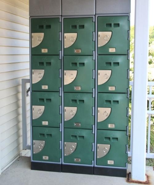 Pickup Lockers pictured with weather safe plastic and metal lockers for library item pickup.